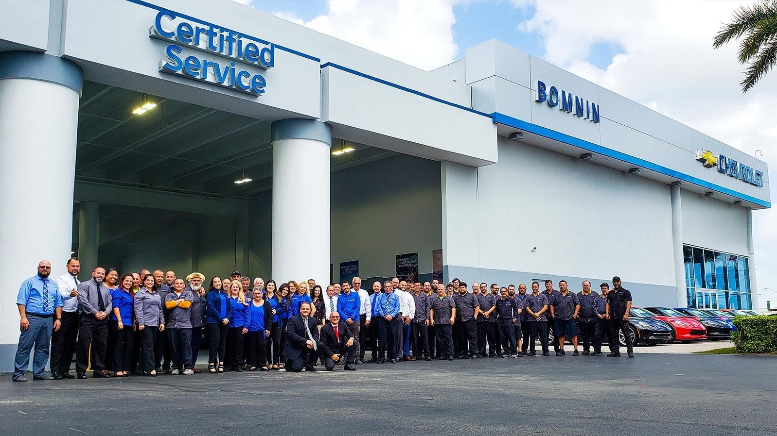 Bomnin Chevrolet Manassas dealership with staff in front