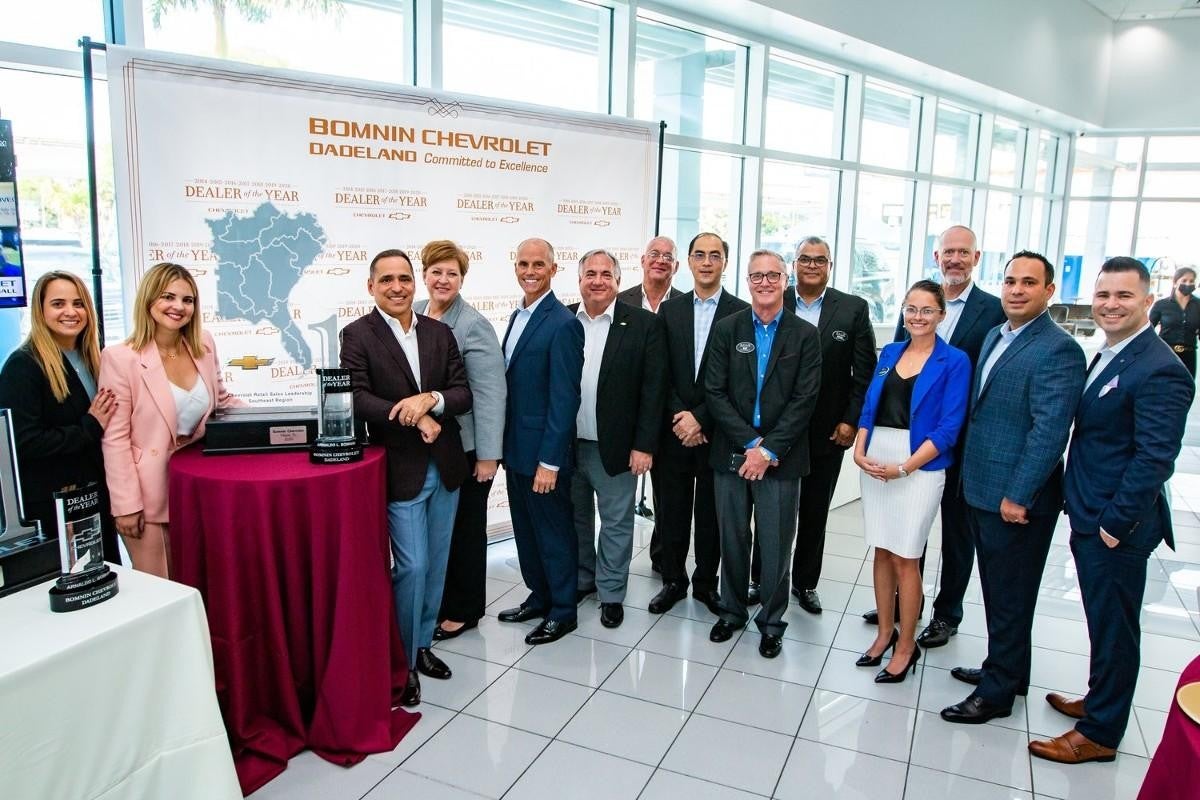 Bomnin Chevrolet Manassas employees accepting an award