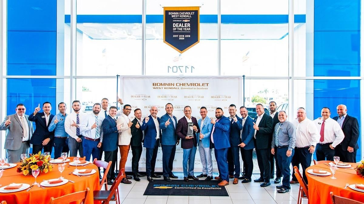 Bomnin Chevrolet Manassas staff at a formal event