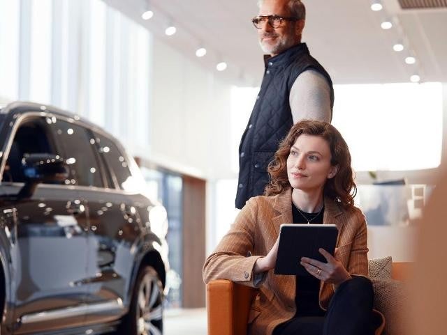 Customer holding a tablet